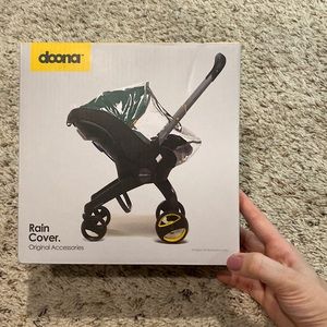 Brand new Doona rain cover